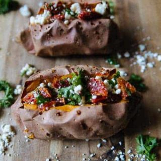 Baked Sweet Potatoes stuffed with feta and sun dried tomatoes