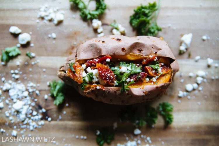 This is a grown up sweet baked potato! Stuffed with feta and sundried tomatoes