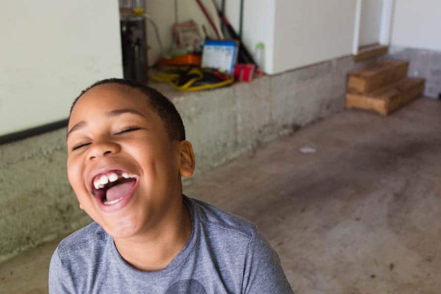 a boy laughing