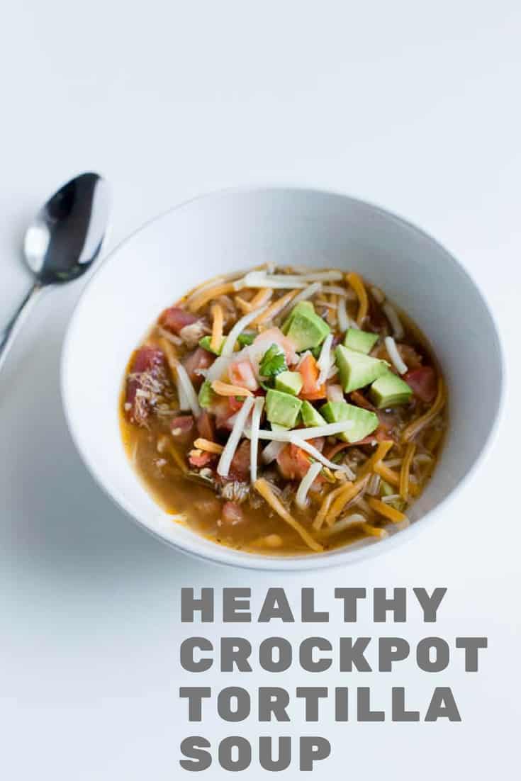 Make this easy crockpot chicken tortilla soup. Gluten free, paleo, whole 30 compliant. Easy to make in the crockpot, slow cooker or insta pot.