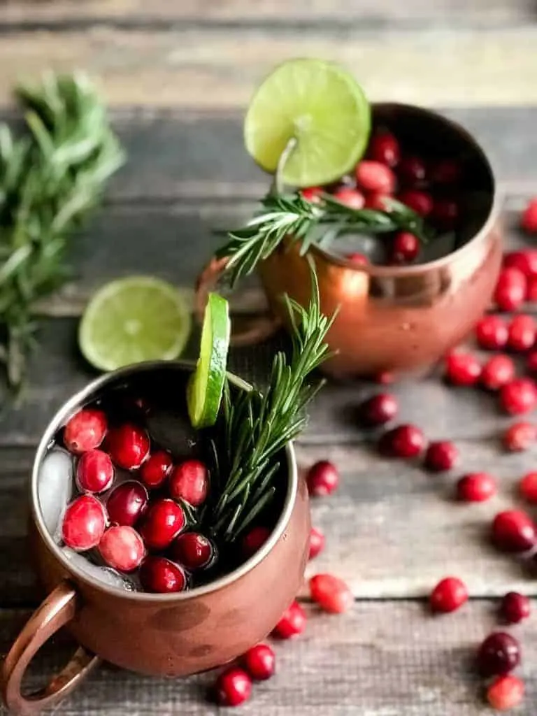 Holiday Moscow Mule with a twist! Cranberry Moscow Mule with Moscato ( a twist)! You will love this holiday twist on this classic and so will your guests this holiday season! #holidays #recipes #moscowmule