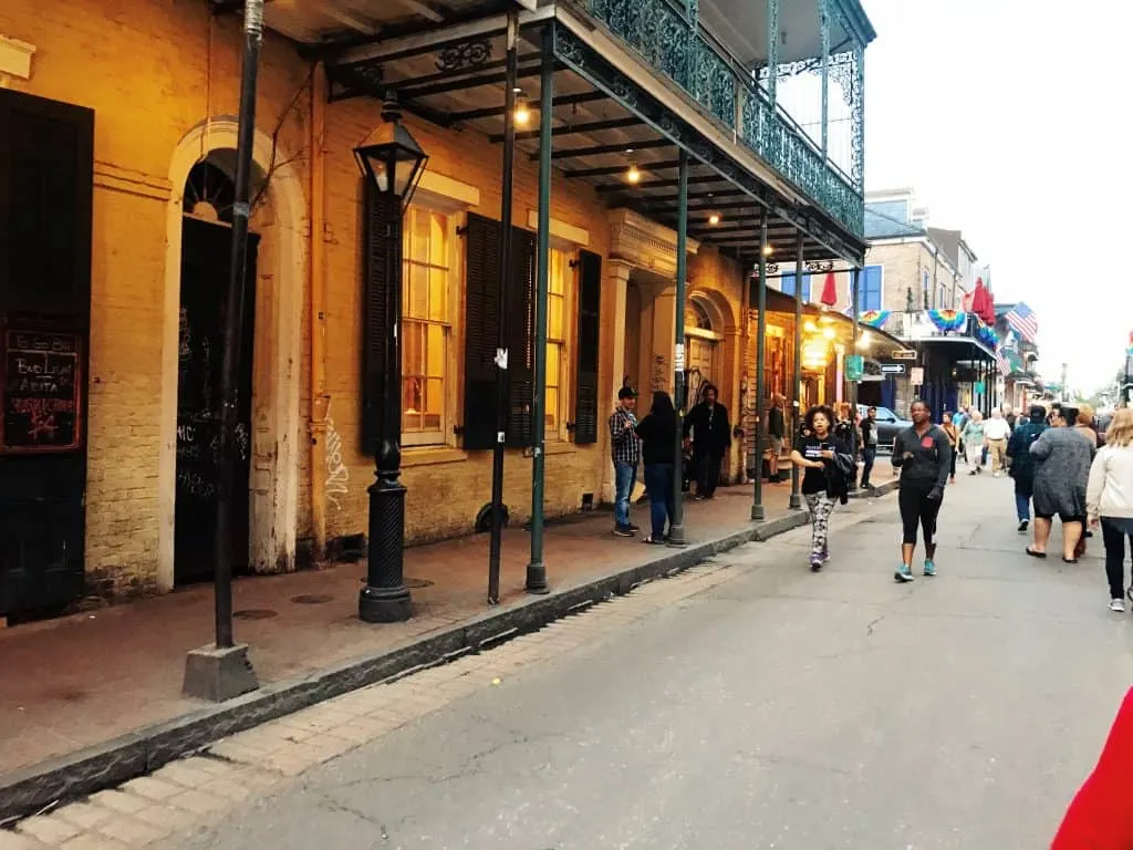 strolling down bourbon street in the french quarter