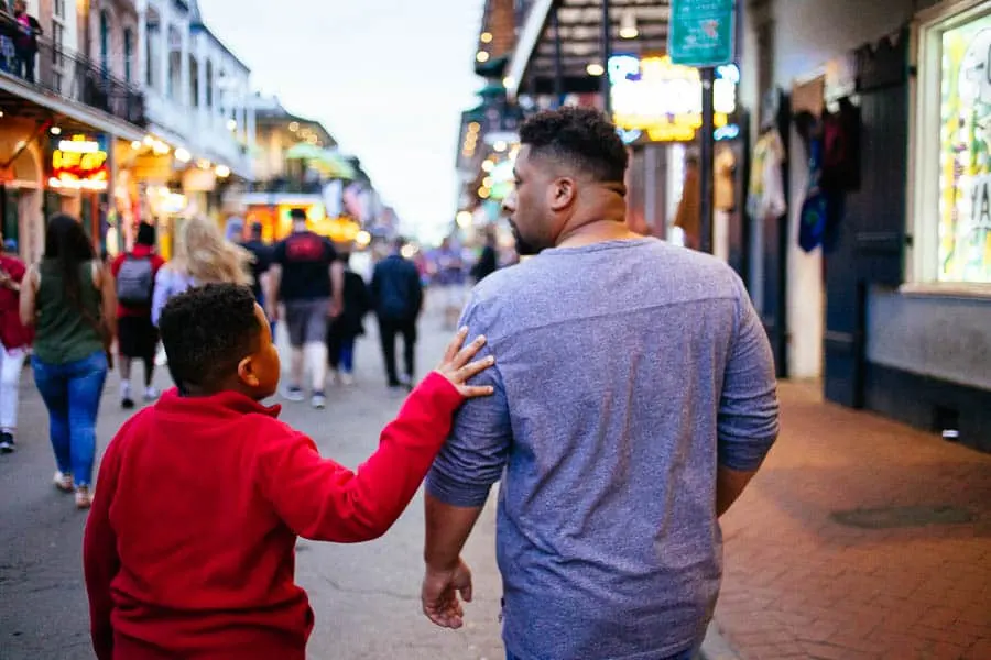 my two guys in the french quarter walking down bourbon street