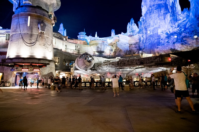 millennium falcon at night at galaxy's edge at disney world 