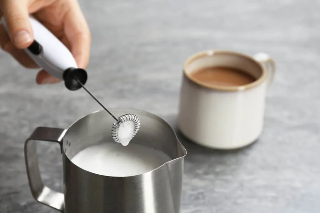 making a latte at home with a frother