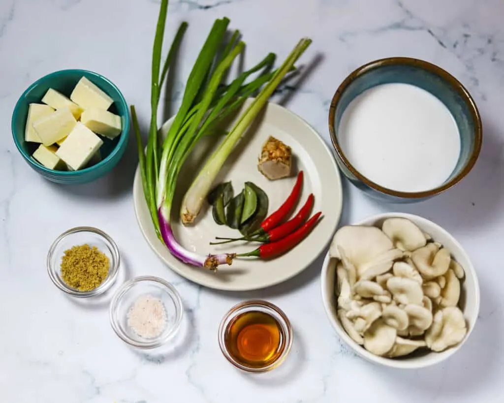 ingredients laid out for a vegan thai coconut soup