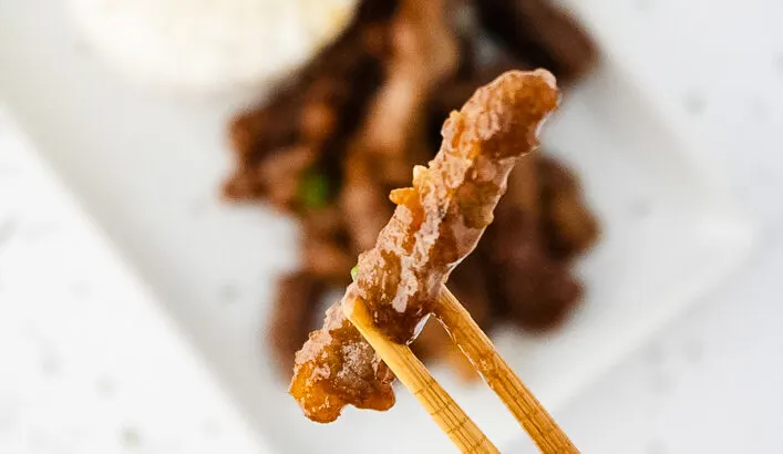 gluten free mongolian beef on a chopstick
