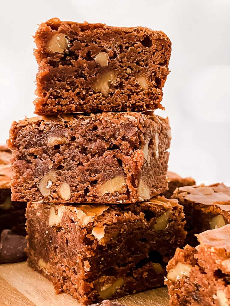 fudgy gluten free brown butter brownies stacked on top of each other