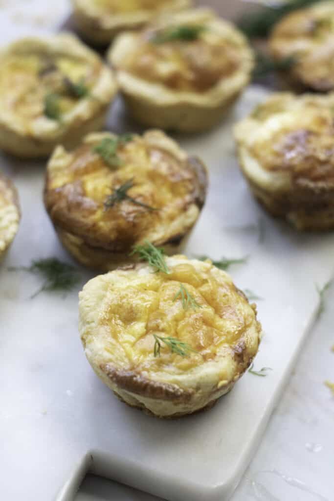 mini salmon quiches fresh out of the oven 