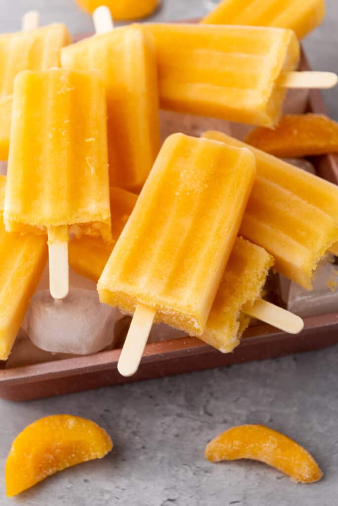 Easy peach rose wine popsicles that are a perfect for grown up summer treat 