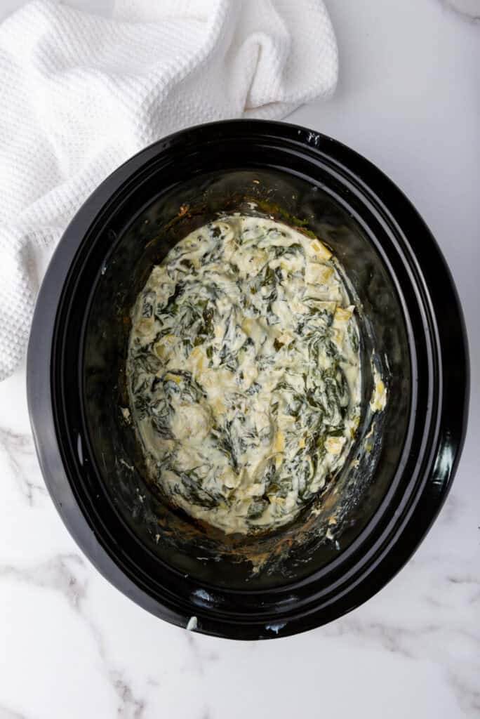 gluten free spinach artichoke dip in crock pot. 