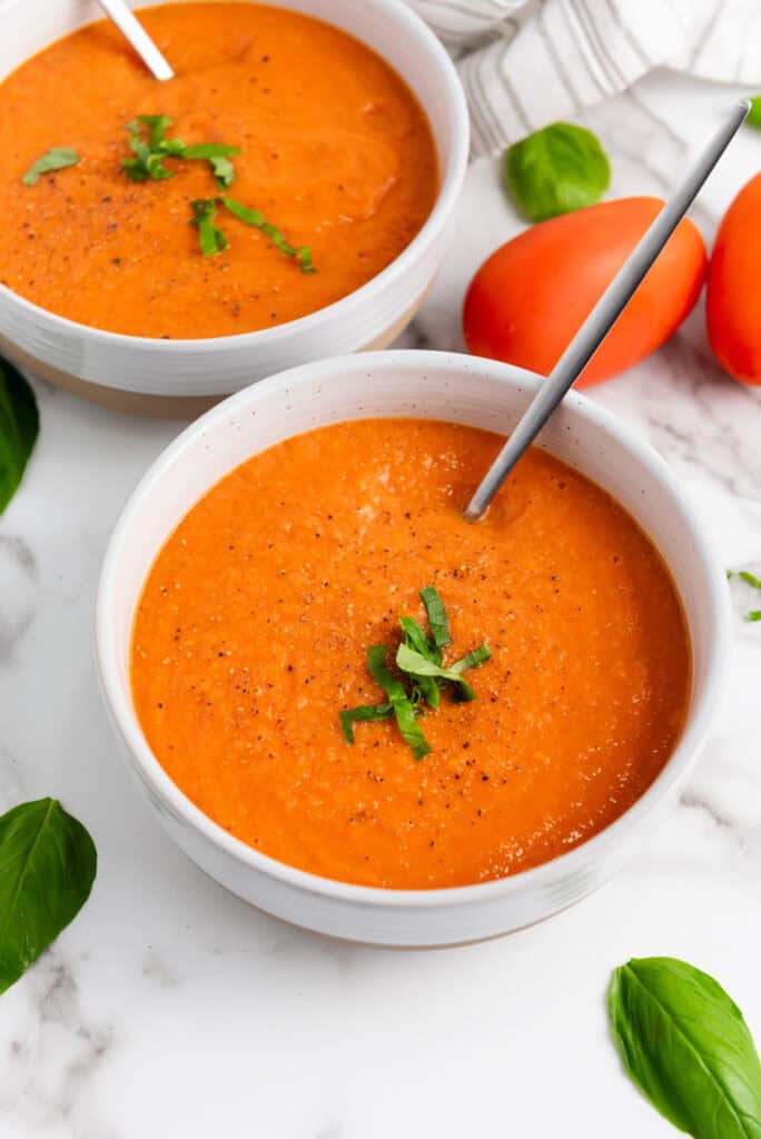 This easy homemade Gluten Free Tomato Soup is perfect for dinner or lunch or anything in between! It is loaded with flavor and so so easy to make.  Perfect meal for a chilly day.