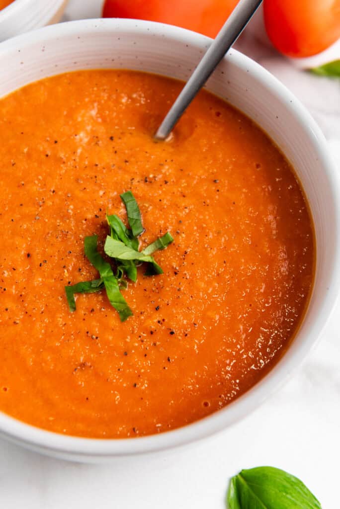 This easy homemade Gluten Free Tomato Soup is perfect for dinner or lunch or anything in between! It is loaded with flavor and so so easy to make.  Perfect meal for a chilly day.